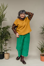 Load image into Gallery viewer, Bouclé Turtleneck Jumper in Mustard with Rainbow Sleeves